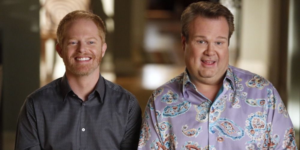 Mitchell and Cameron smiling in Modern Family