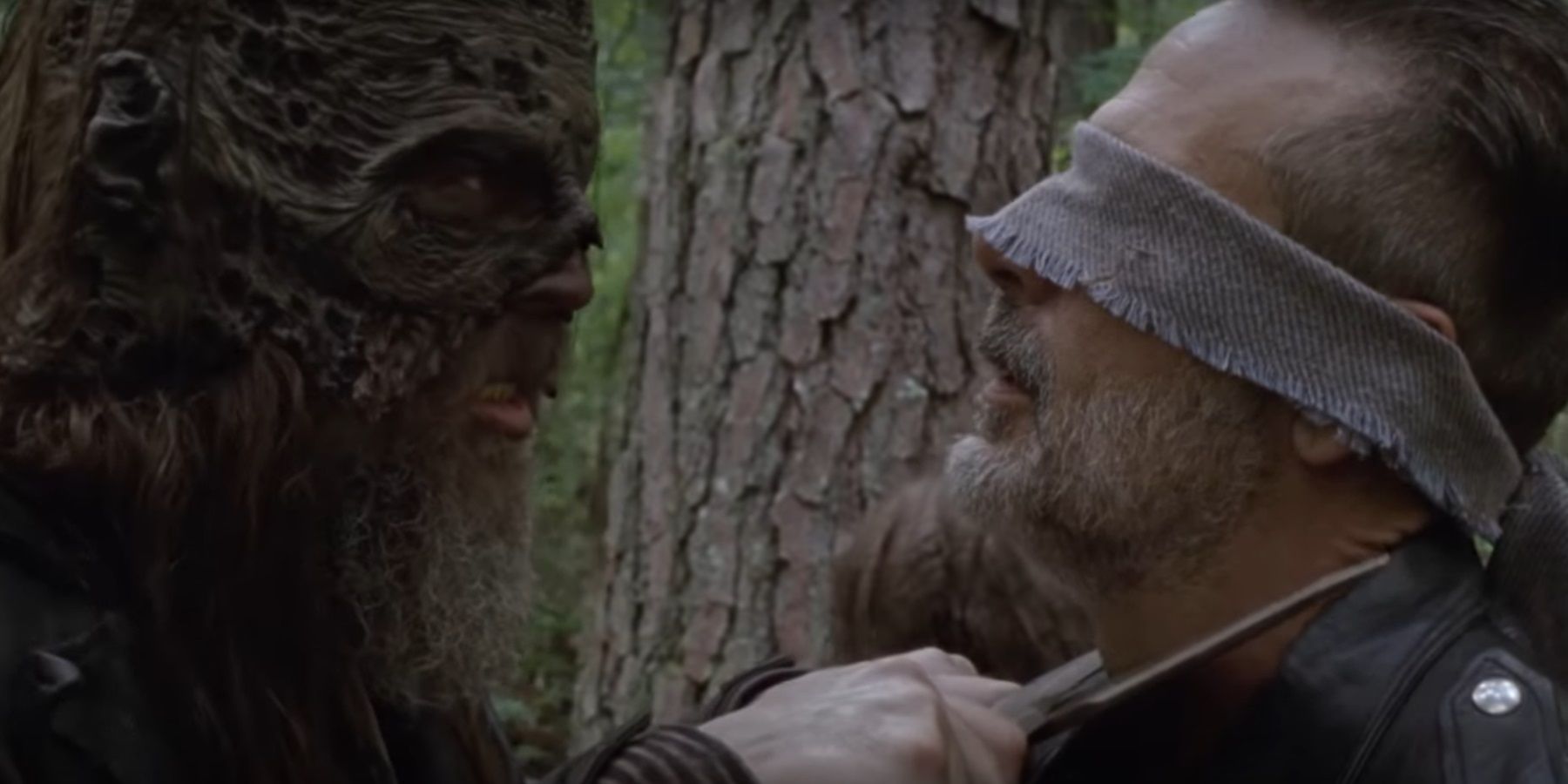 Beta (Ryan Hurst) with a knife to Negan's (Jeffrey Dean Morgan) throat in The Walking Dead.