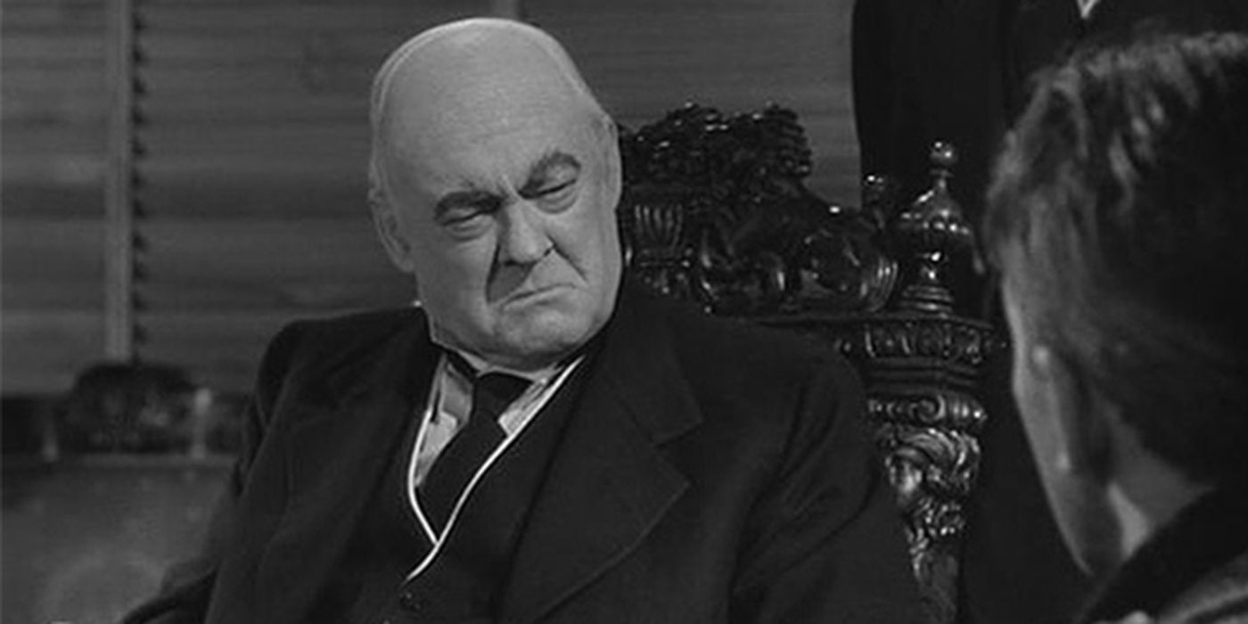 Old Man Potter with George Bailey in It's A Wonderful Life.