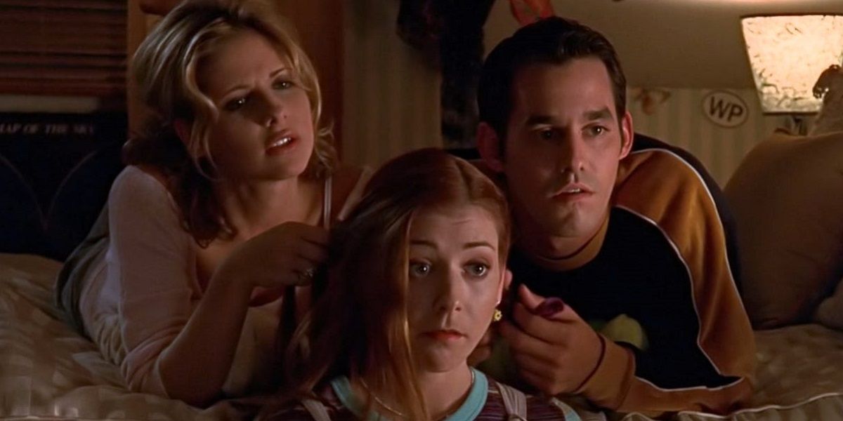 Buffy and Xander playing with Willow's hair on Buffy the Vampire Slayer