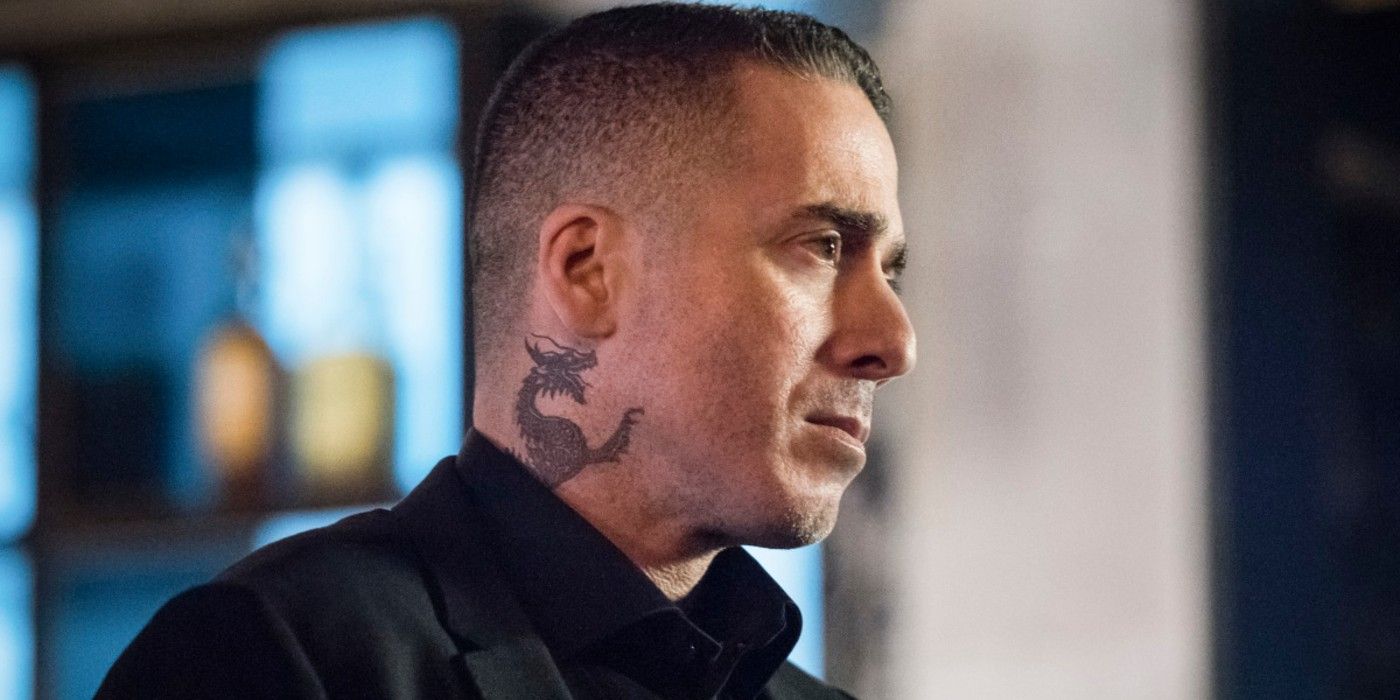 Ricardo Diaz with his neck tattoo in Arrow