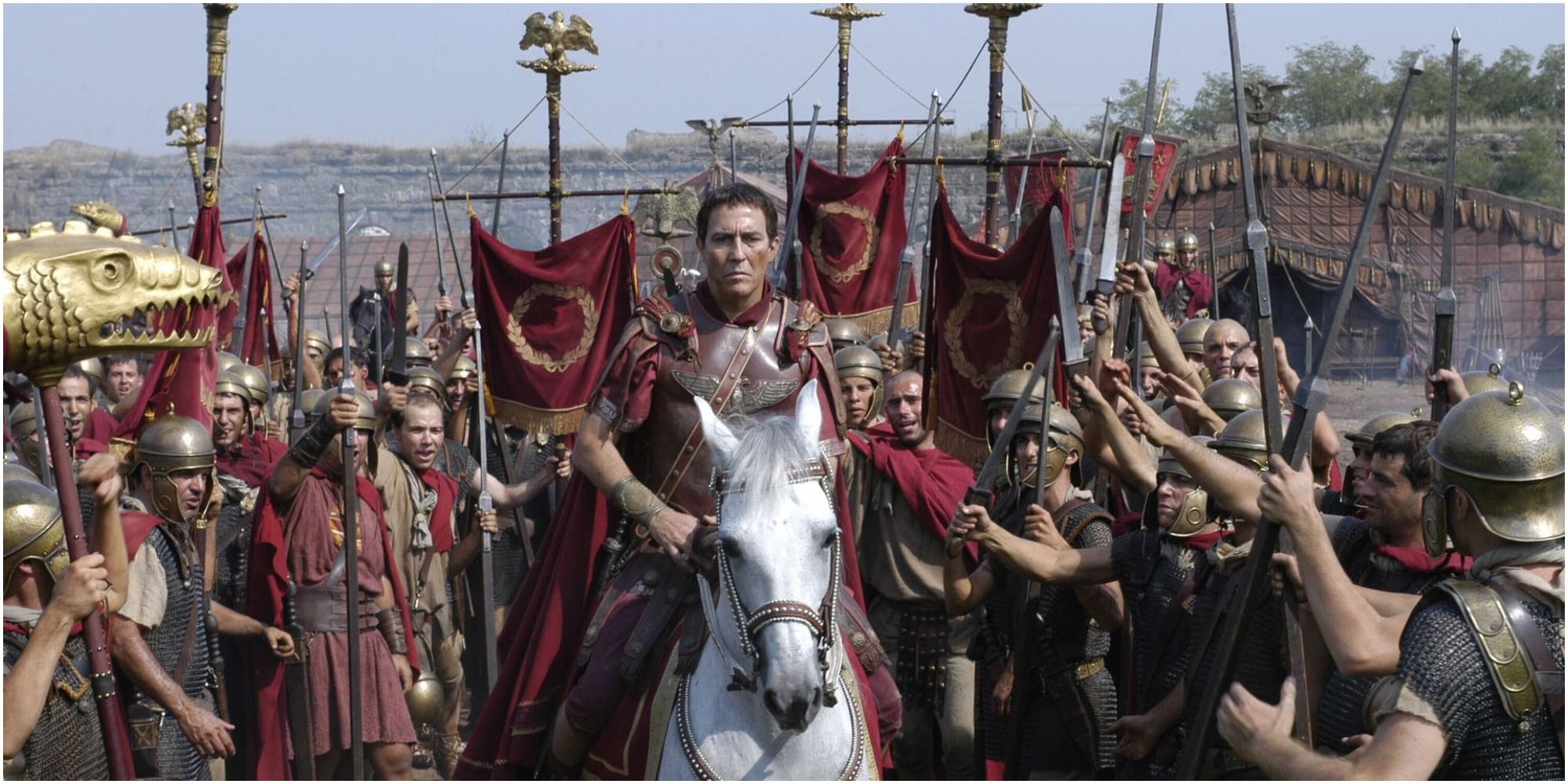 HBO series Rome large crowd of roman soldiers holding up weapons surrounding one on horseback