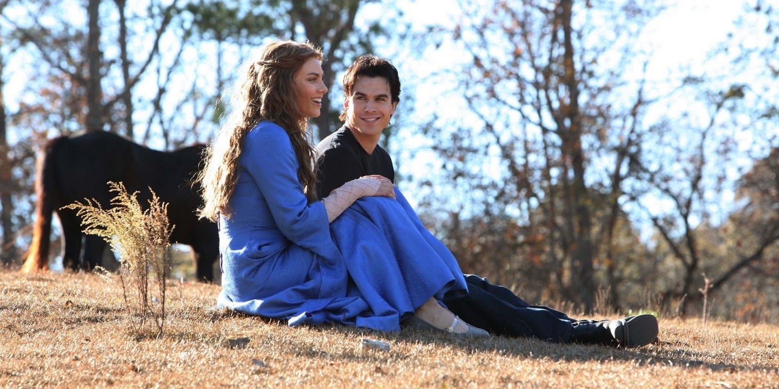 Damon sits with Rose in The Vampire Diaries.