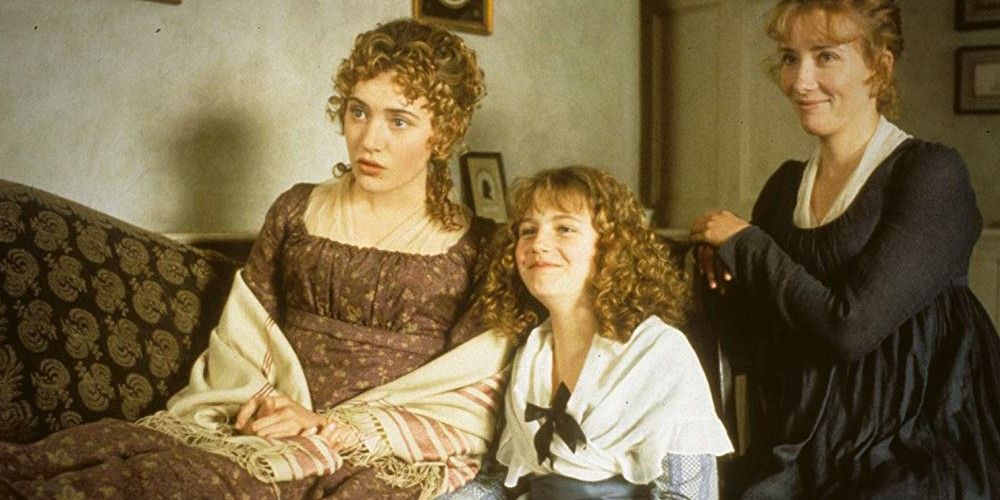 Kate Winslet looking shocked and Emma Thompson smiling in Sense and Sensibility