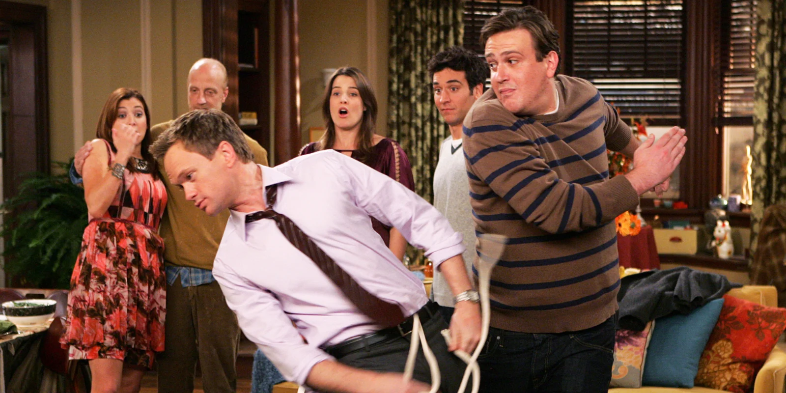 Marshall slaps Barney in How I Met Your Mother.