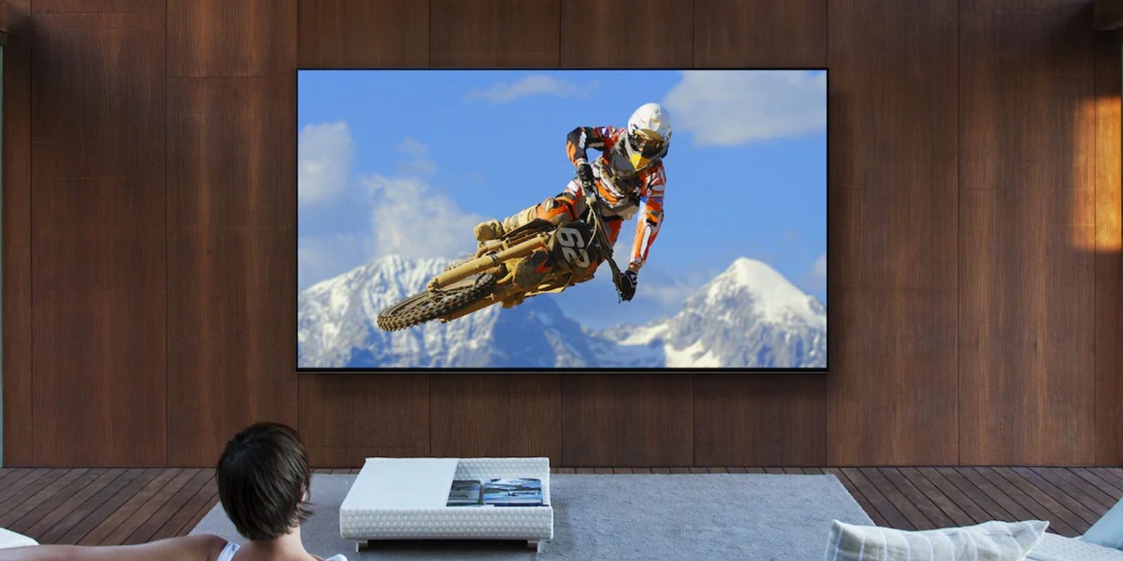The Pros (& Cons) of a 4K Projector Vs 4K HD TV in Your Home Theater