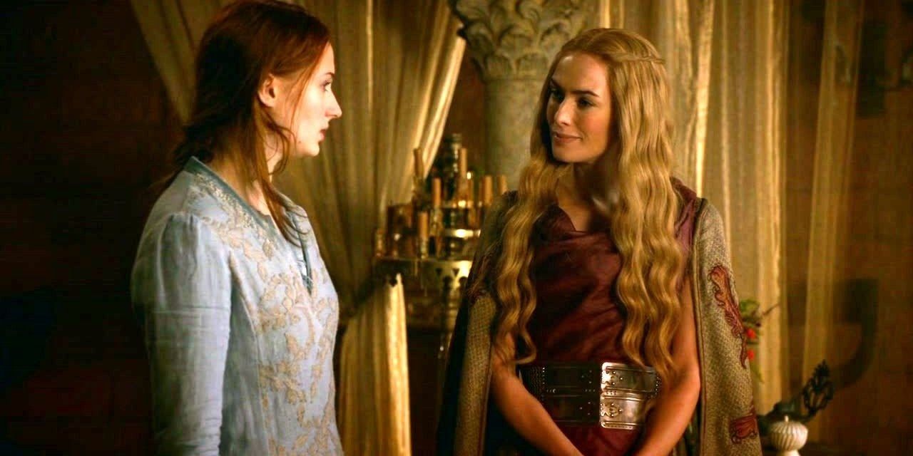Cersei smiling at a nervous Sansa