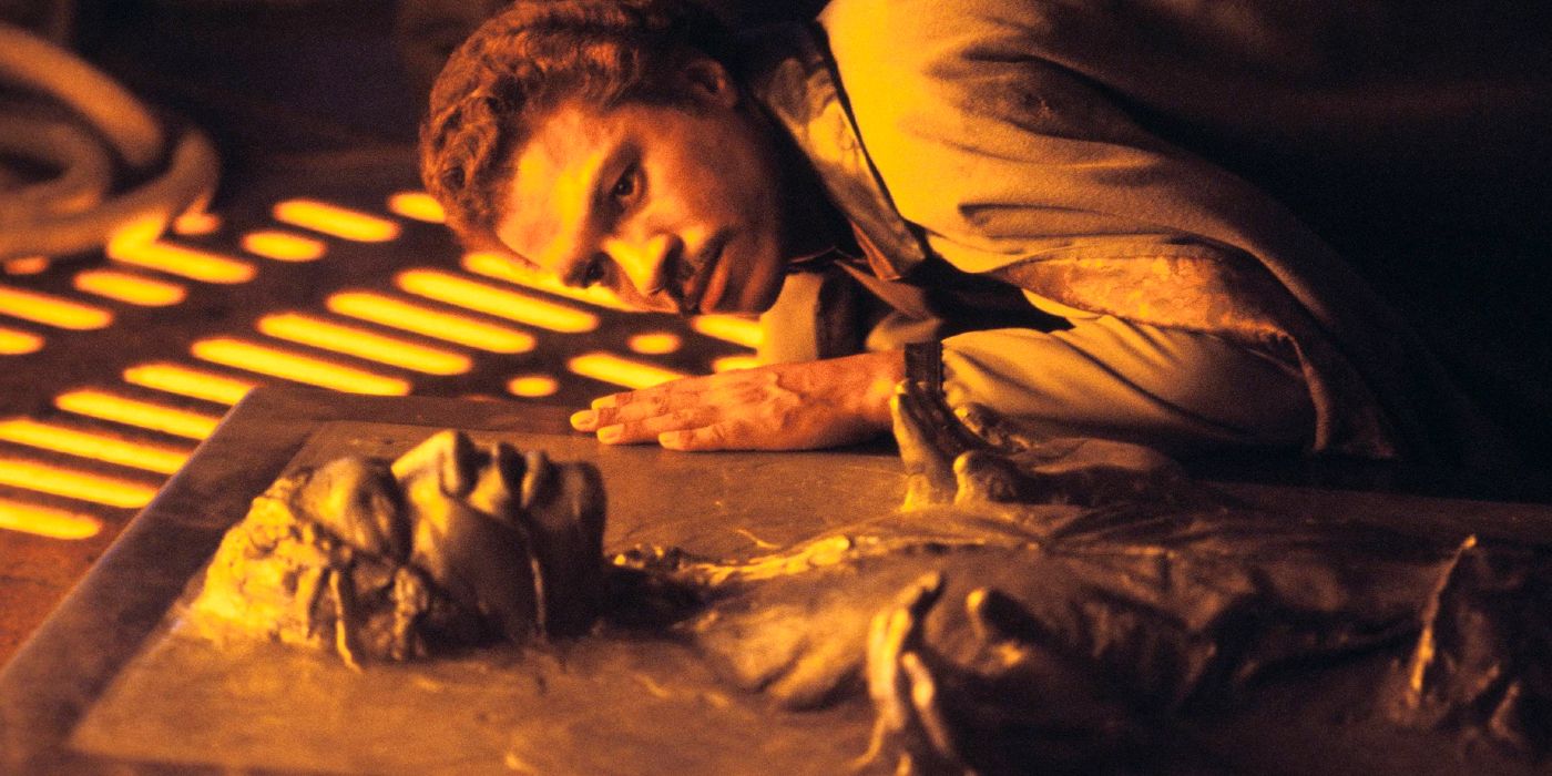 Lando looking at Han Solo frozen in carbonite in Empire Strikes Back.