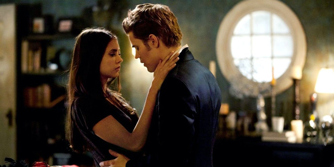 Stefan and Elena holding each other in The Vampire Diaries.
