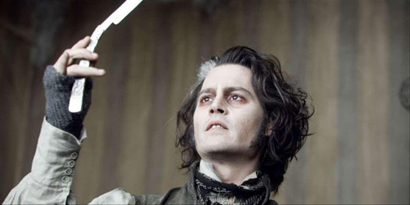Sweeney Todd looking at his silver razor blade
