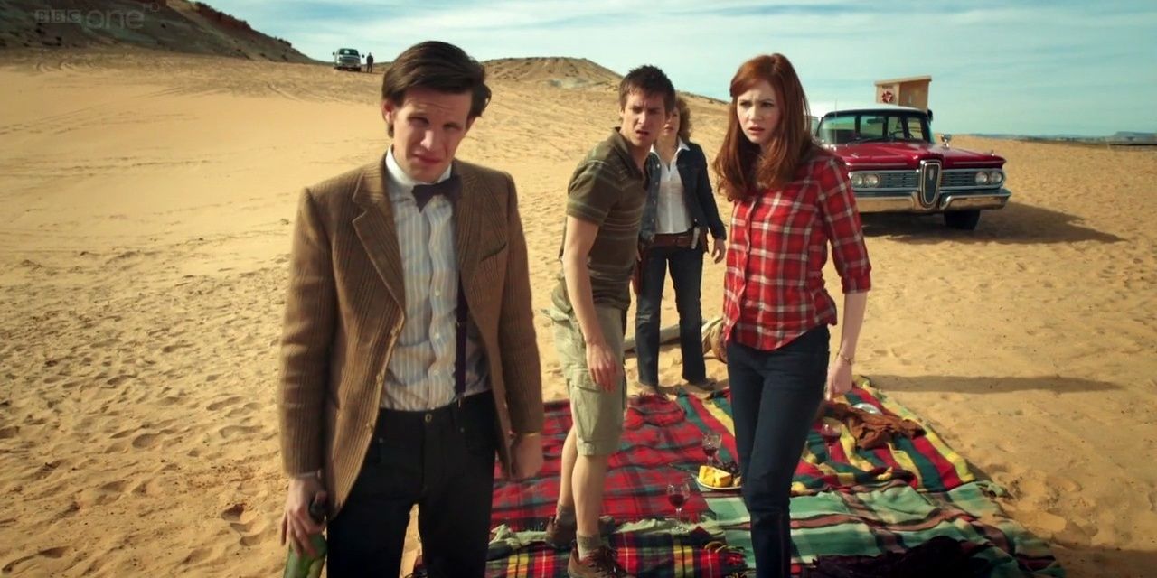 The Doctor and his companions at Lake Silencio in Doctor Who