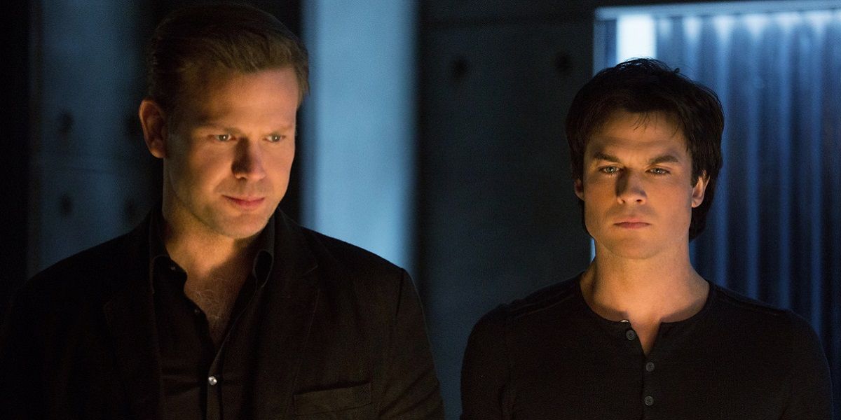 Alaric and Damon standing together on The Vampire Diaries