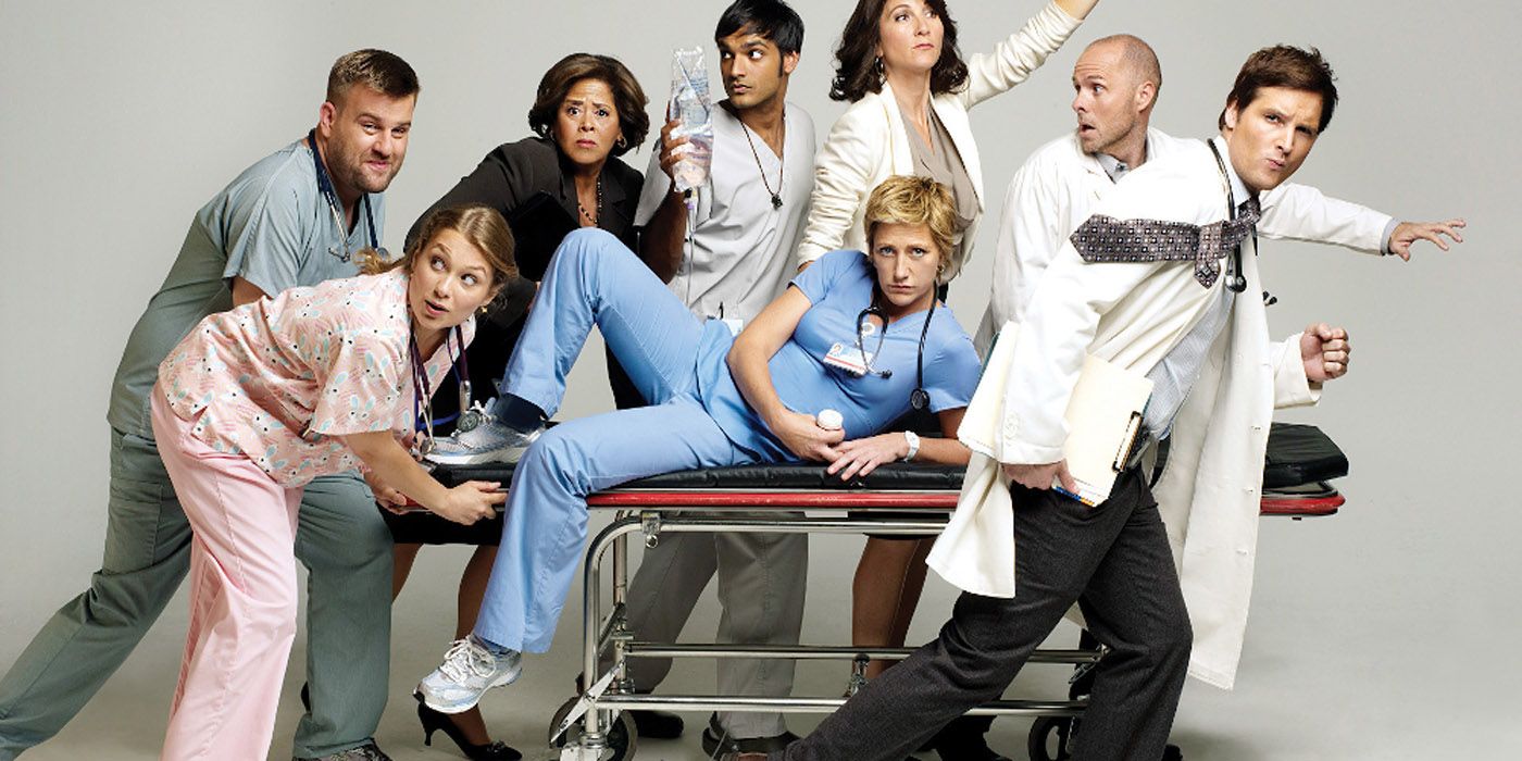 The caast of Nurse Jackie posing.