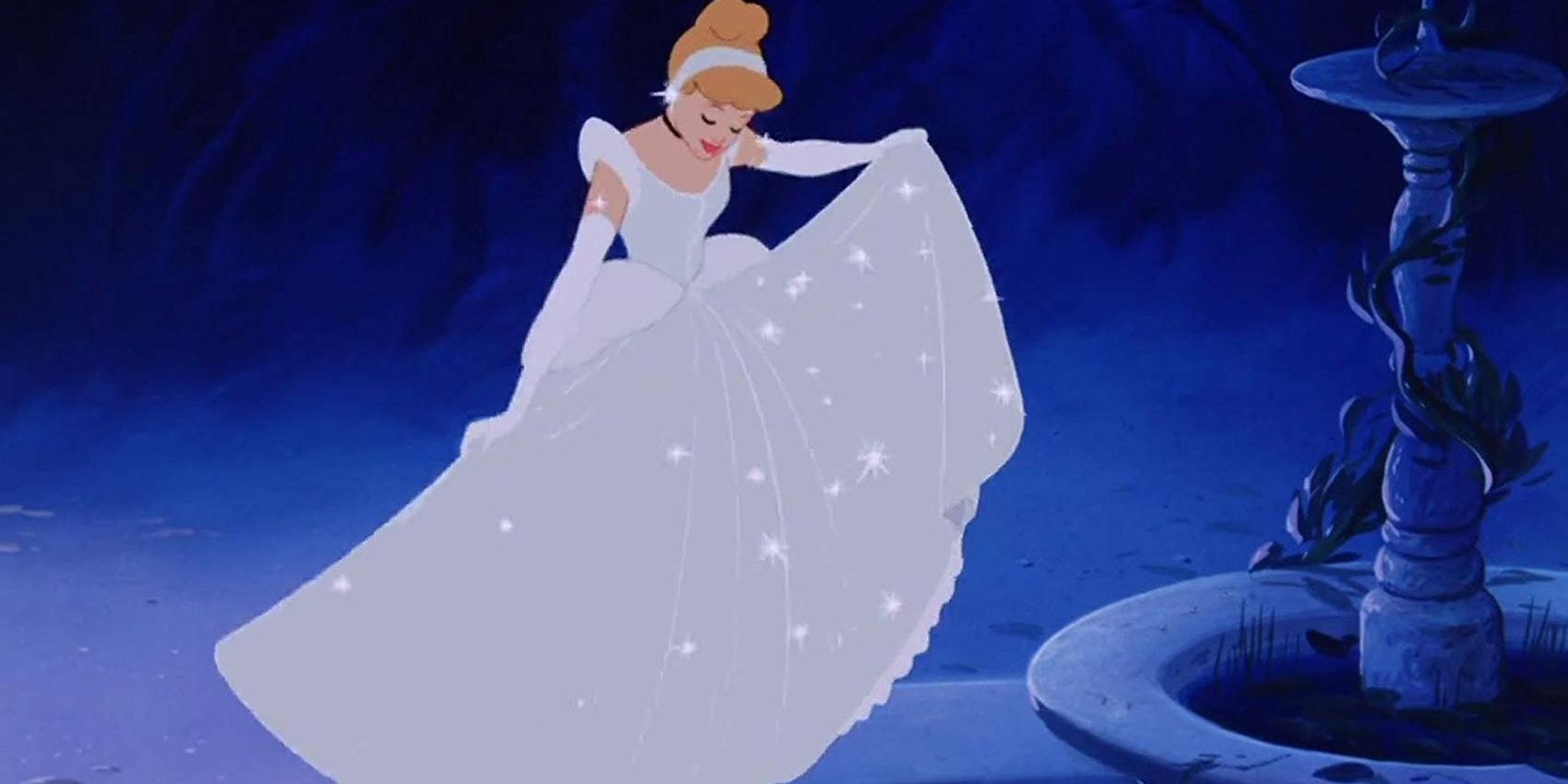 The definitive version of Cinderella, 1950, where she looks at her glittering white dress by a fountain
