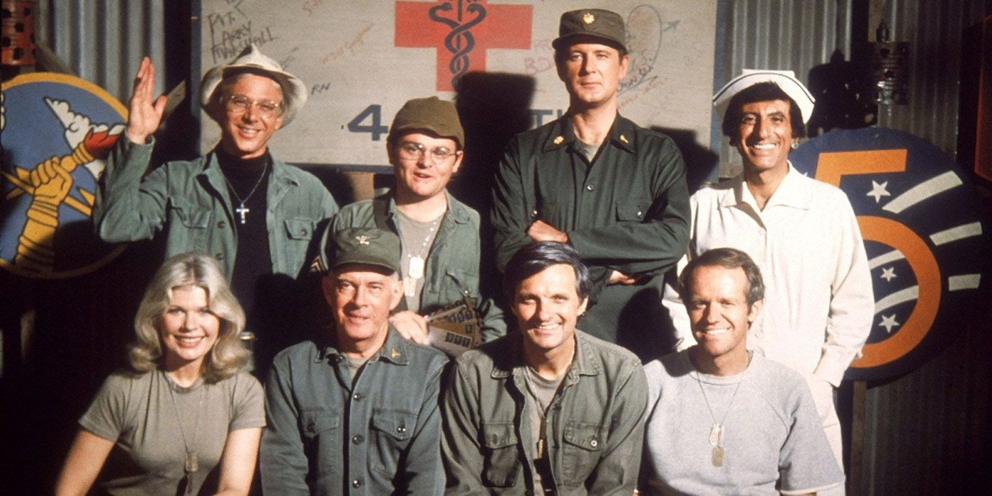 The soldiers on Mash posing for a photo.