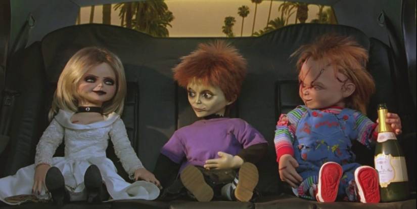 Tiffany, Glen/Glenda, and Chucky in the backseat of a car in Seed of Chucky