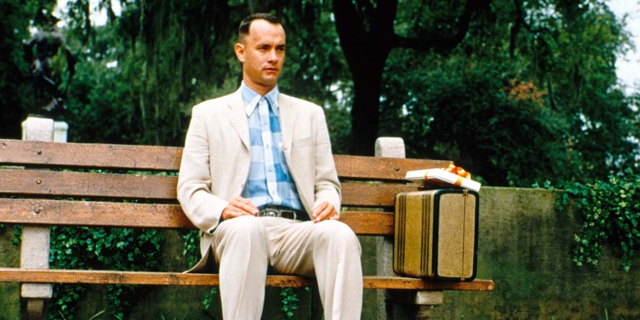 Tom Hanks sitting on a bench in Forrest Gump