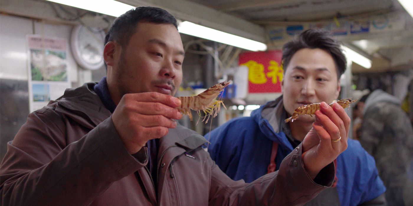 David Chang holding fish on Ugly Delicious