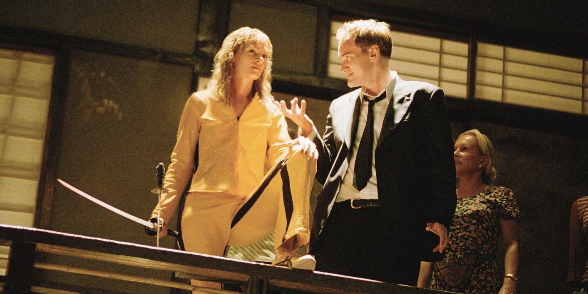 Uma Thurman and Quentin Tarantino on Kill Bill set