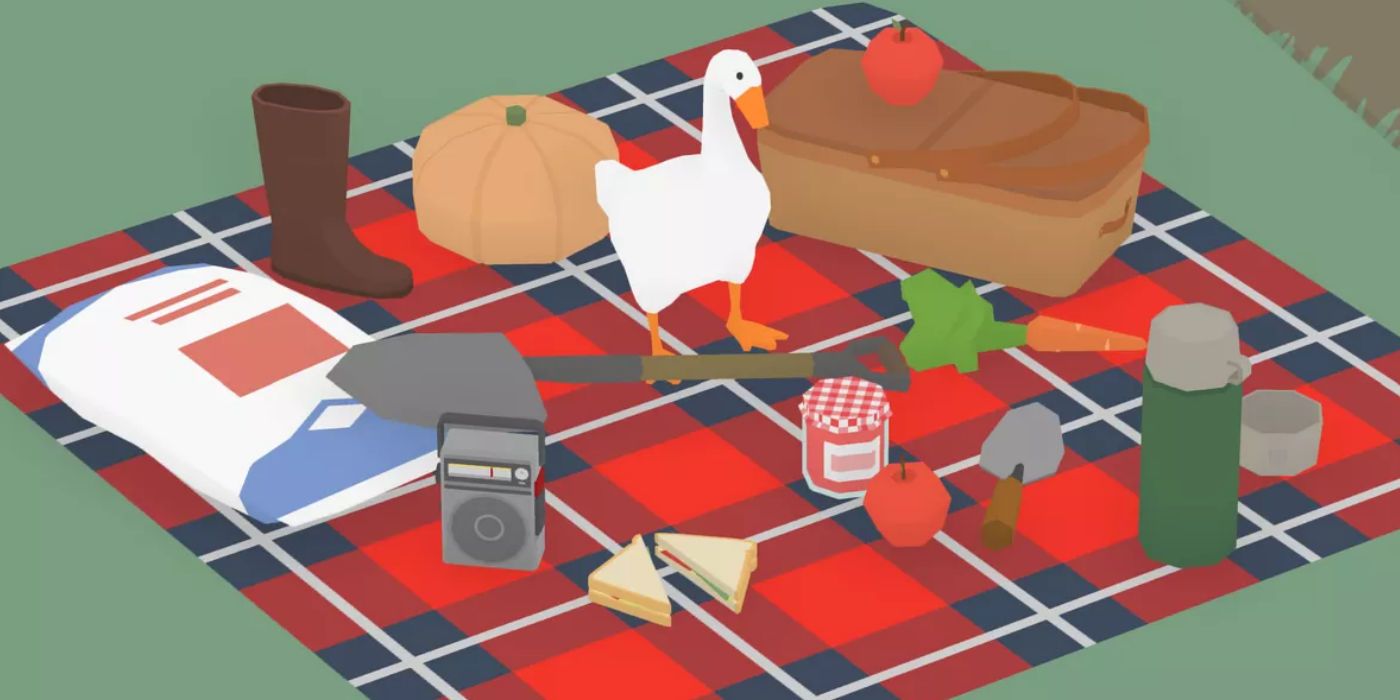 A goose standing among various picnic items.