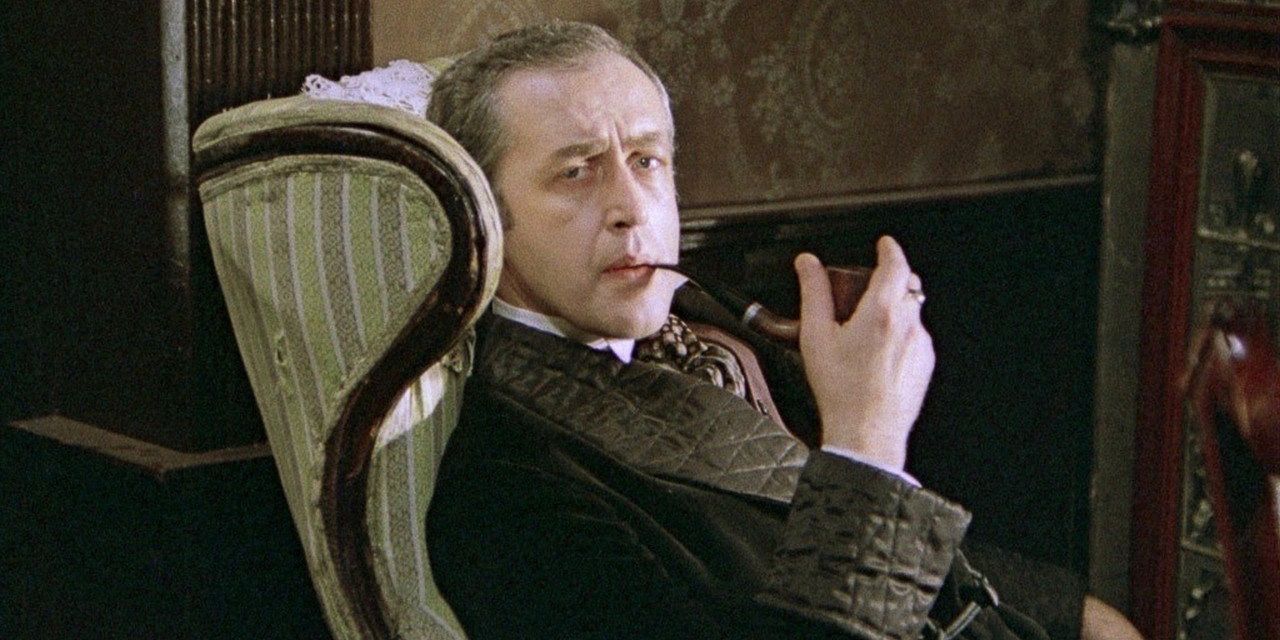 Vasily Livanov as Sherlock Holmes smoking a pipe