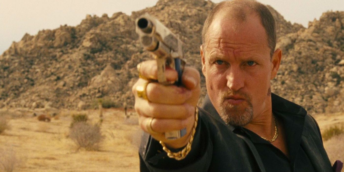 Woody Harrelson holding a gun in Seven Psychopaths