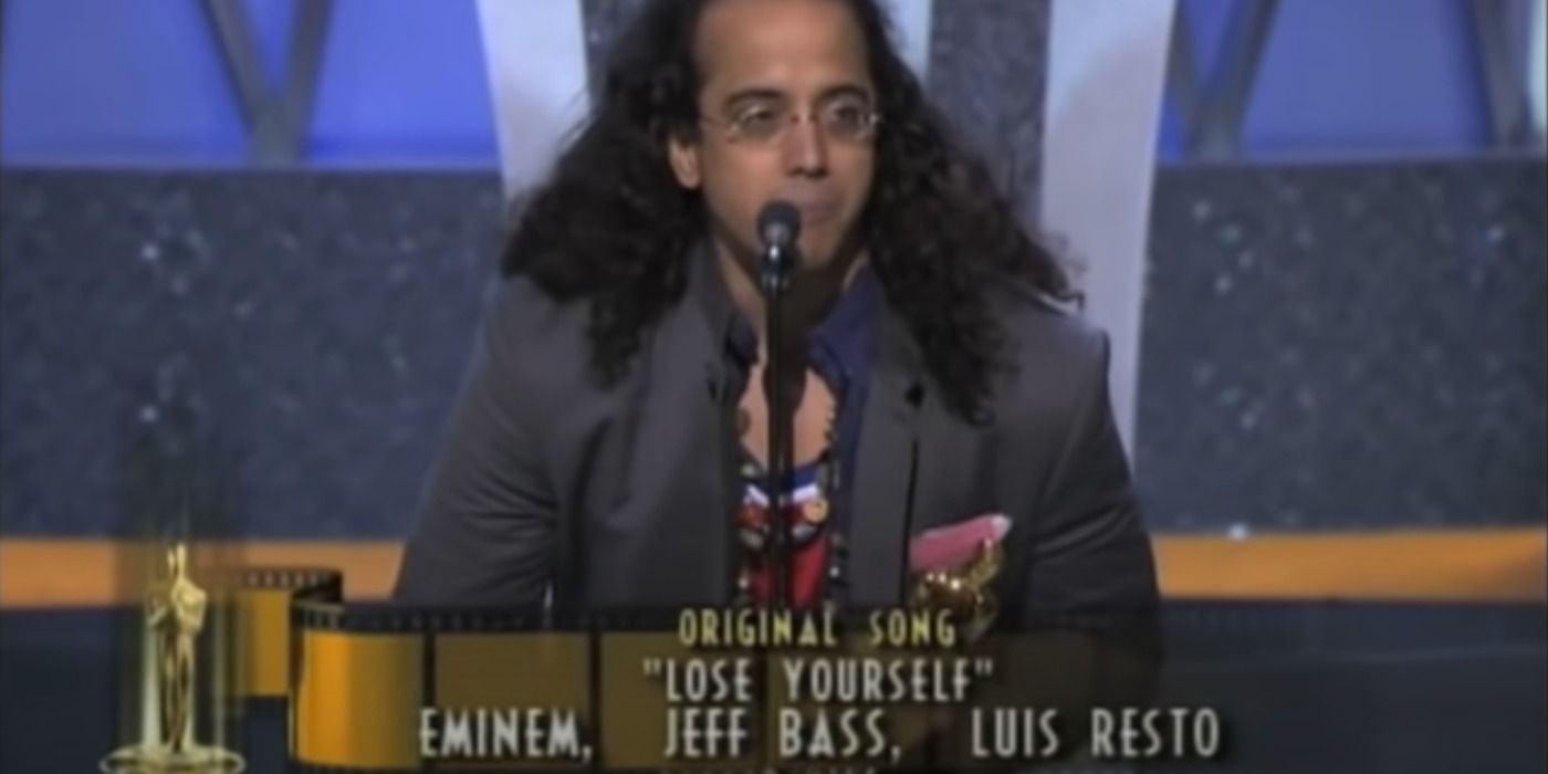 Man accepts Oscar for Lose Yourself by Eminem in 8 Mile.