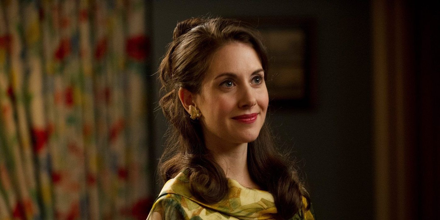 Trudy Campbell smiling in her house in Mad Men