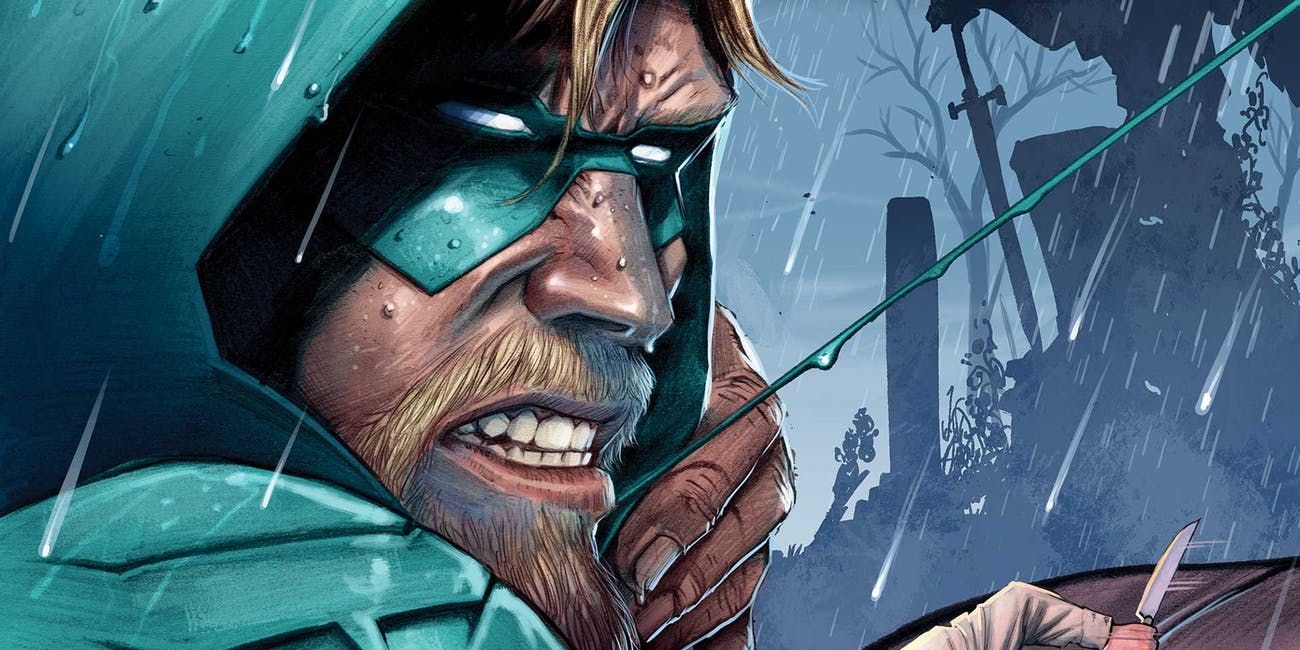 A close up of Green Arrow pointing his bow