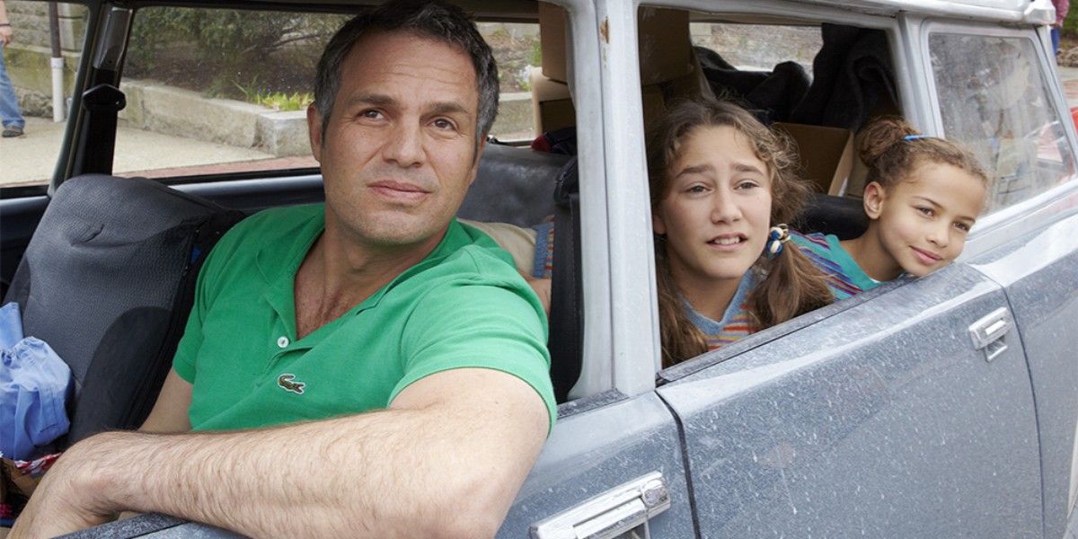 A family in a car looking out the windows in Infinitely Polar Bear