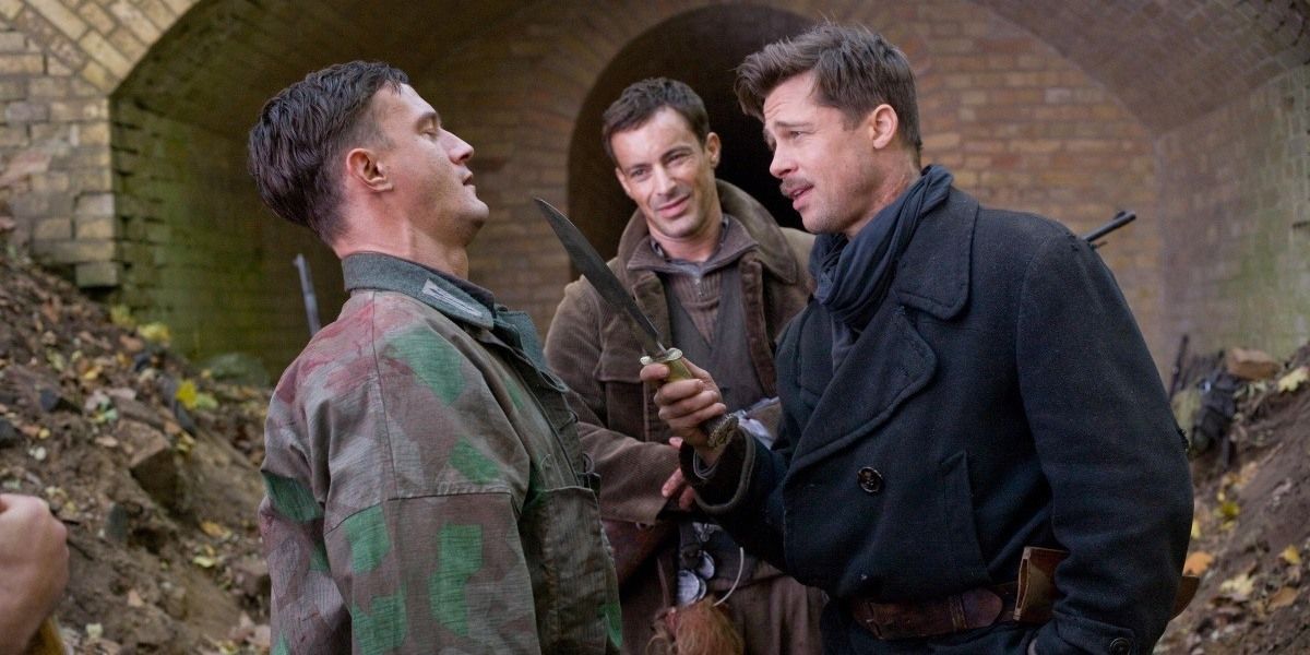 Aldo threatens a nazi soldier with a knife in Inglourious Basterds