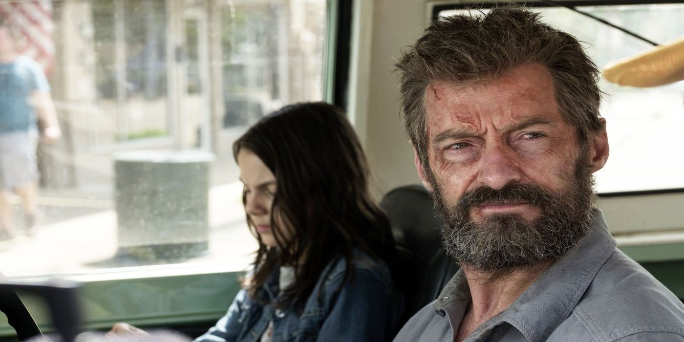 Hugh Jackman and Daphne Keen riding in the car in Logan