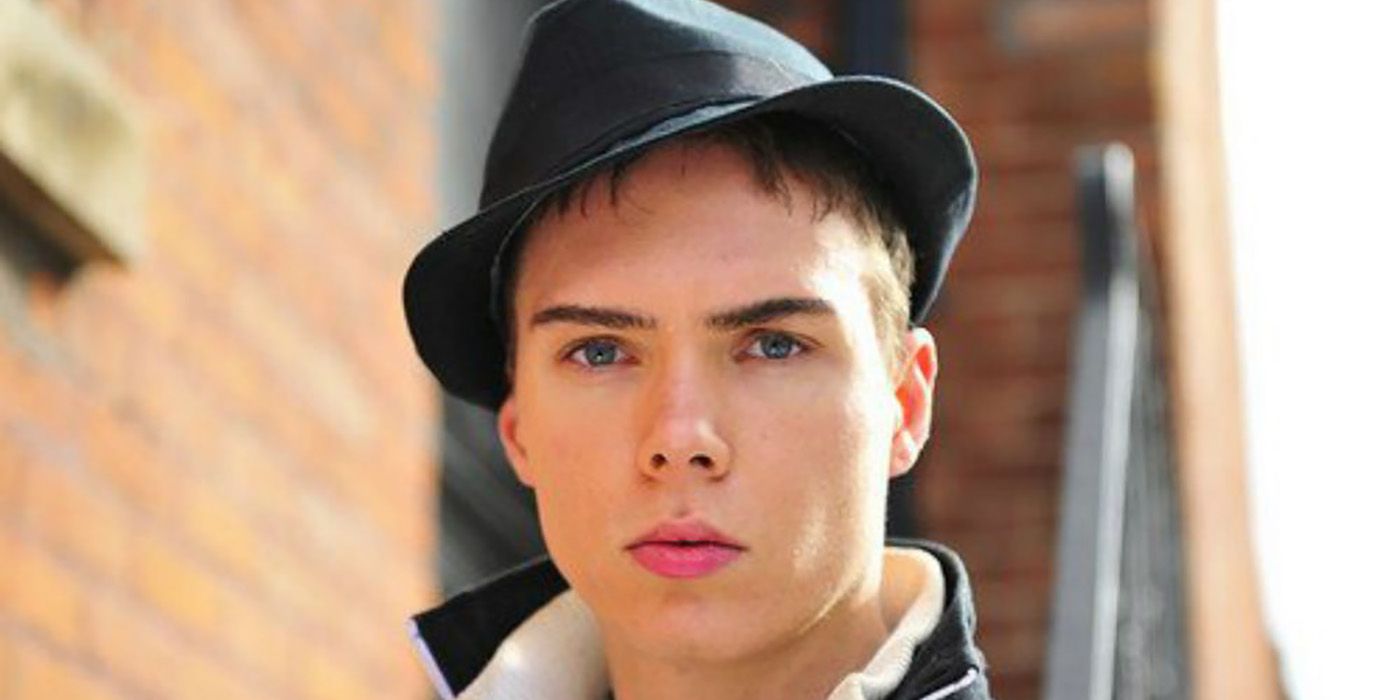 Luke Magnotta posing and wearing a hat in Don't F*** with Cats