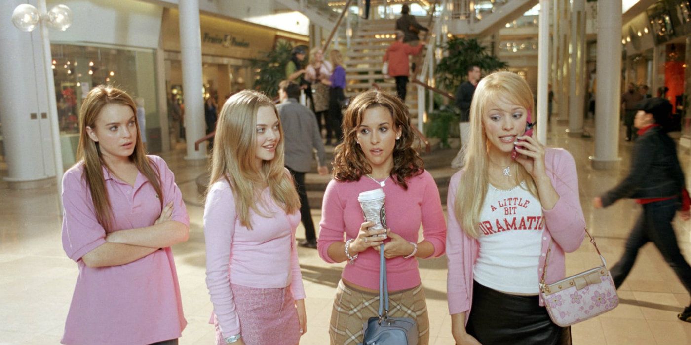 An image of Regina, Cady, Gretchen, and Karen walking in the mall together in Mean Girls