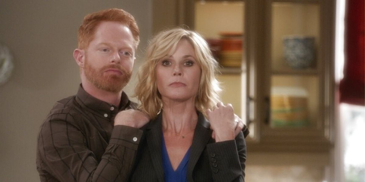 Mitch and Claire standing together on Modern Family