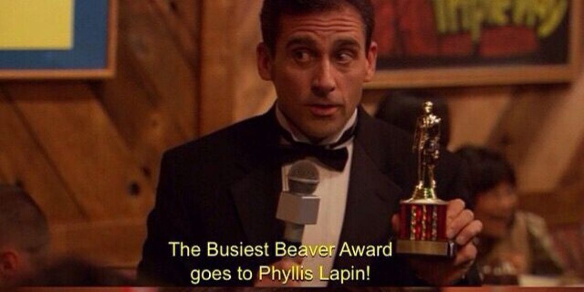 Michael gives Phyllis a Dundie award on the office