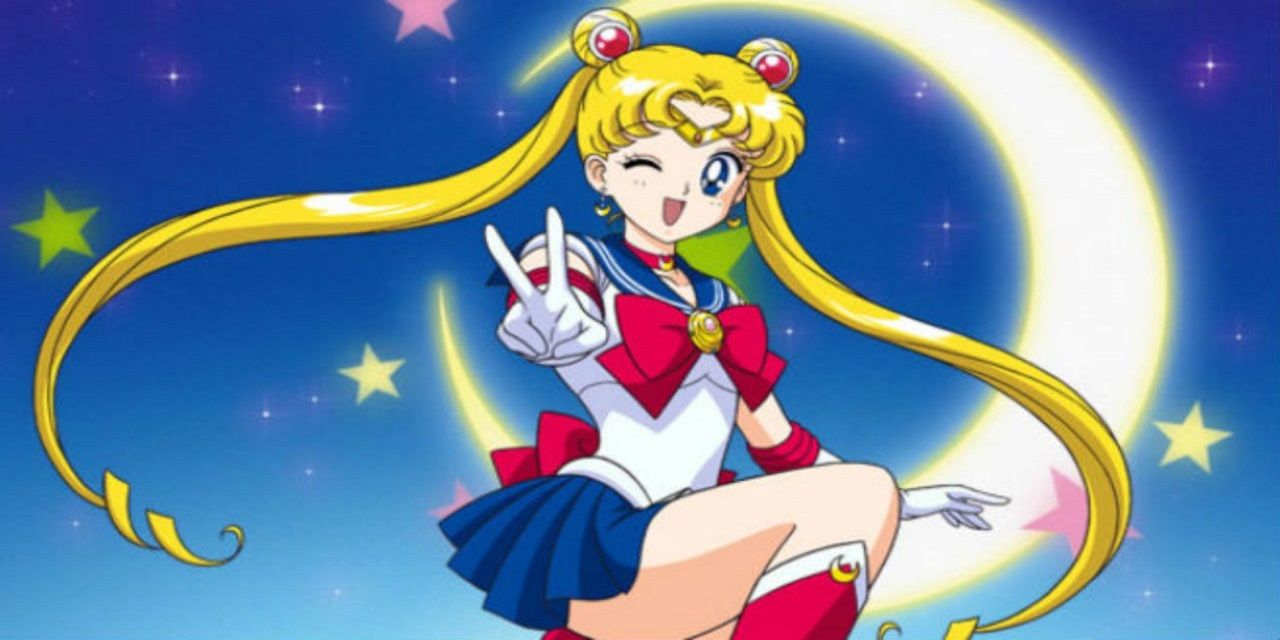 Sailor Moon offers a peace sign in front of a crescent moon