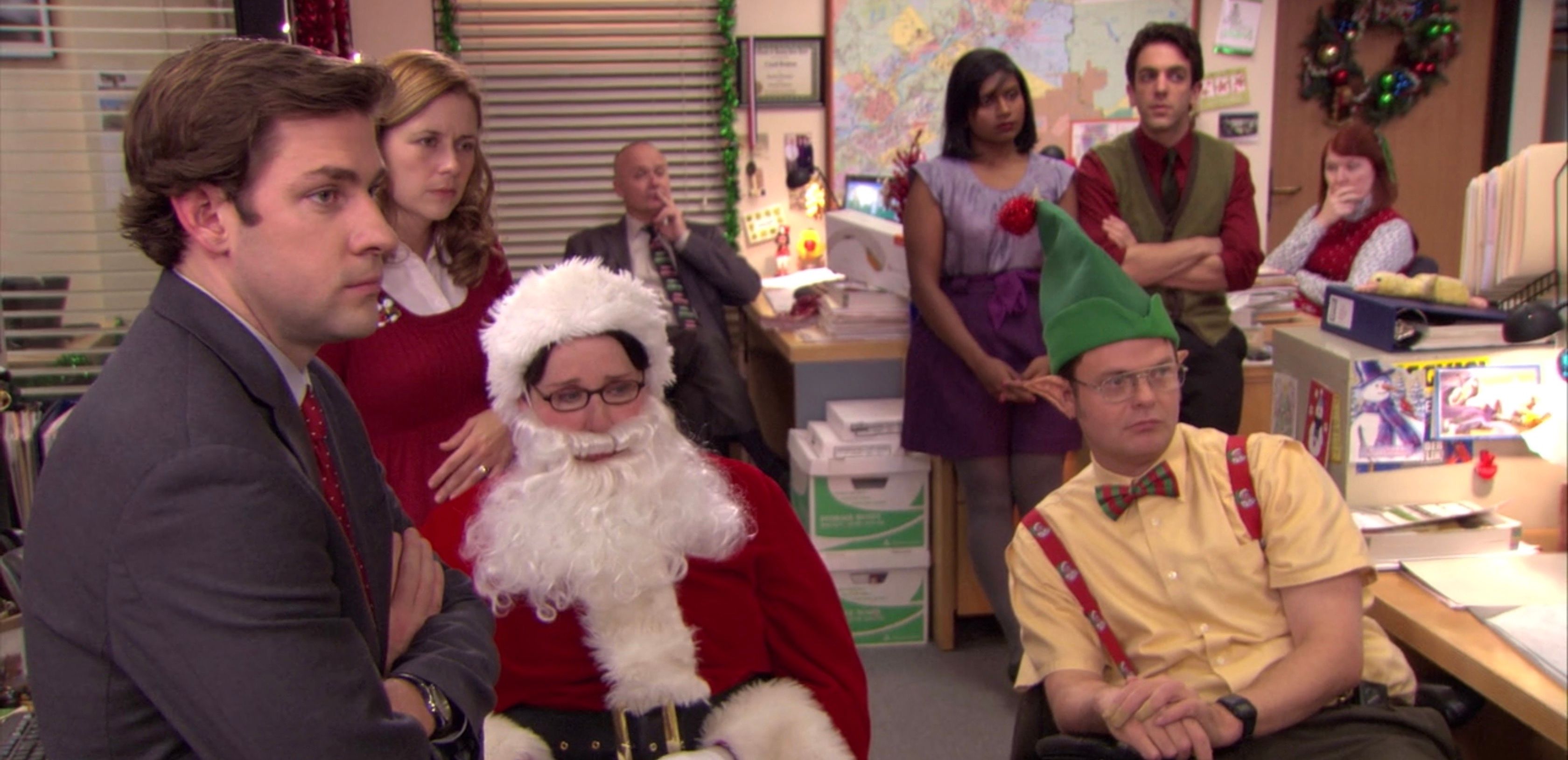 The cast of the Office dressed up in Secret Santa Christmas episode.