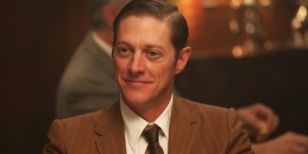 Ted Chaough smiles in Mad Men.