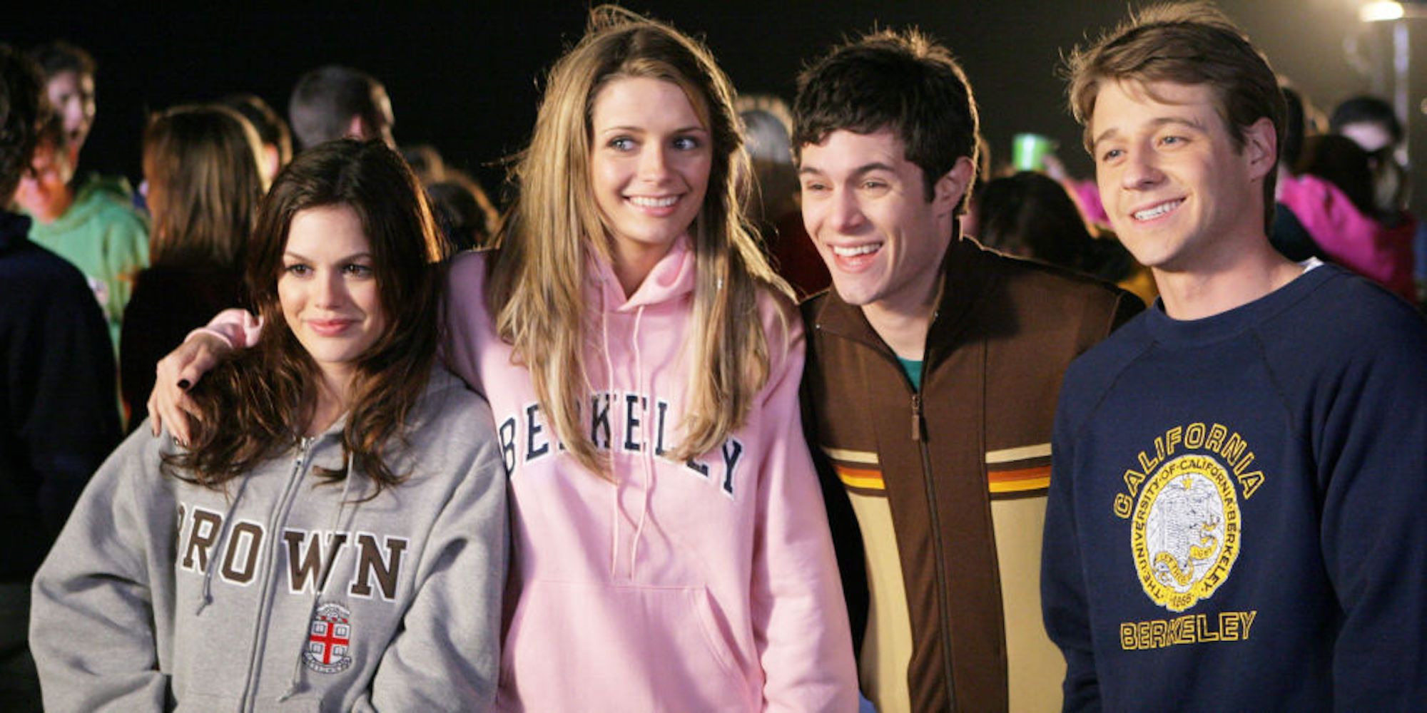 Summer, Marissa, Seth, and Ryan pose for a photo in The O.C.