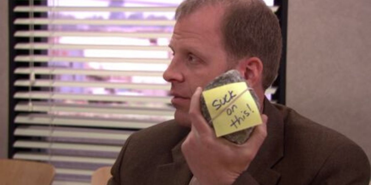 Toby holding a rock on The Office