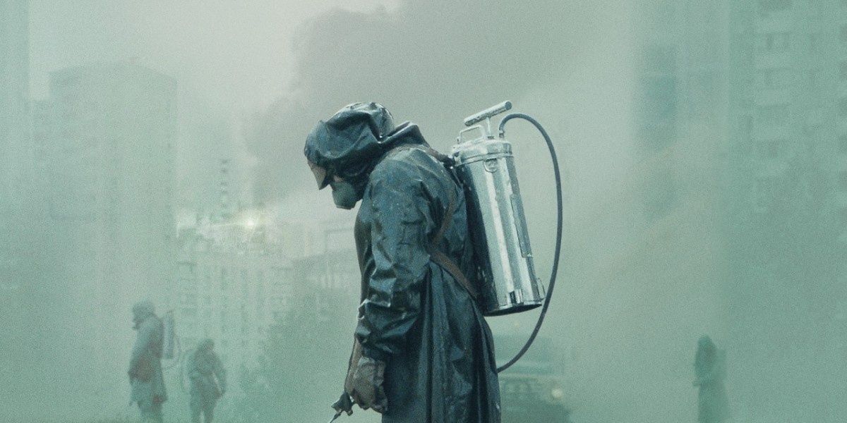 A man wearing Hazmat suit with a foggy background in image from Chernobyl 
