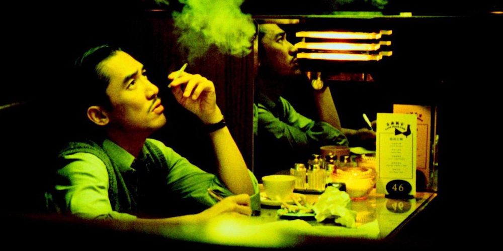 Tony Chiu-Wai Leung smoking in a bar in 2046
