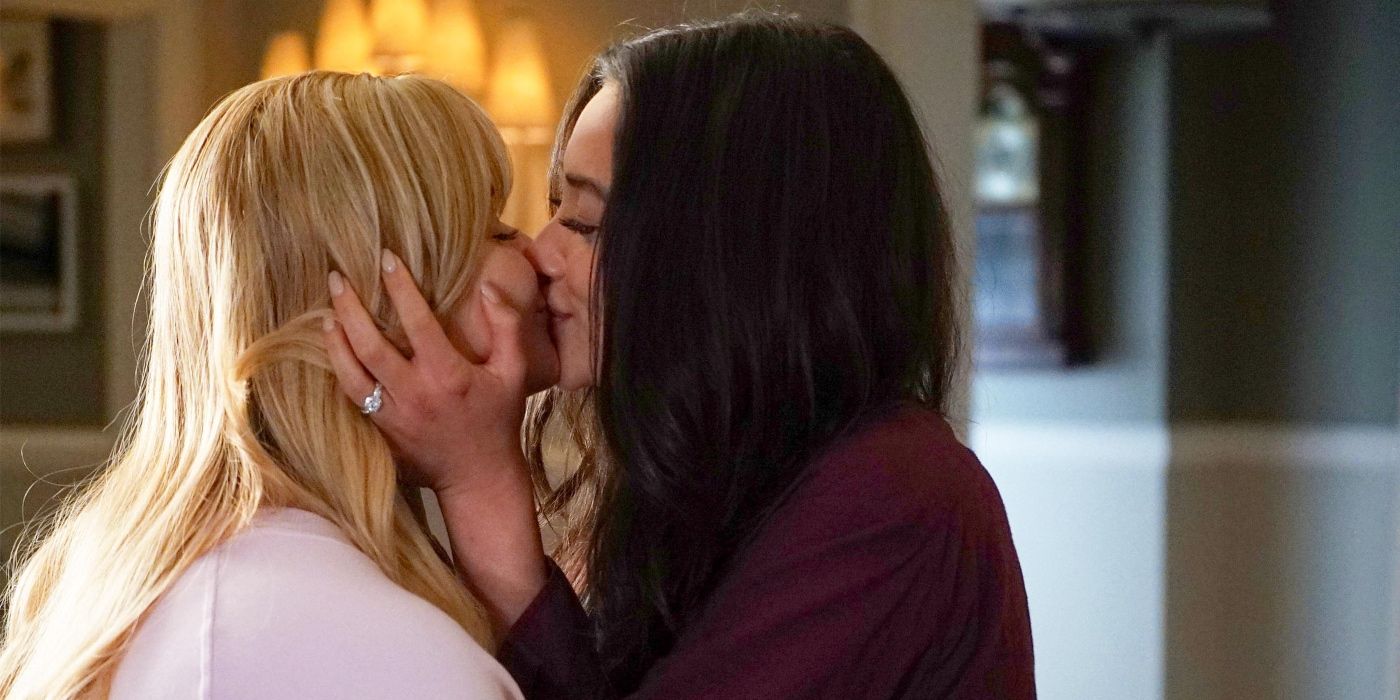 Emily and Alison kissing 