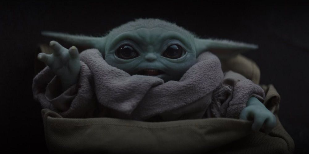 Baby Yoda does the magic hand thing in The Mandalorian