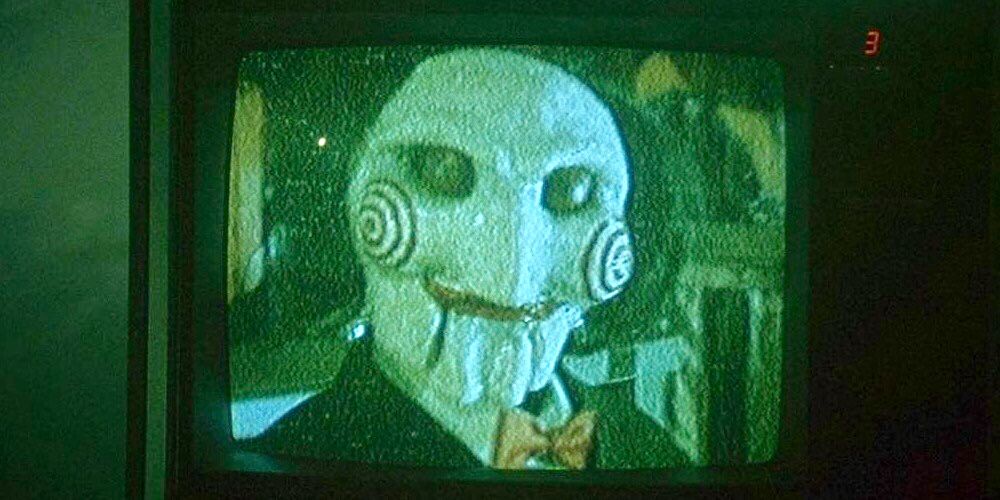 Billy on a TV screen from Saw