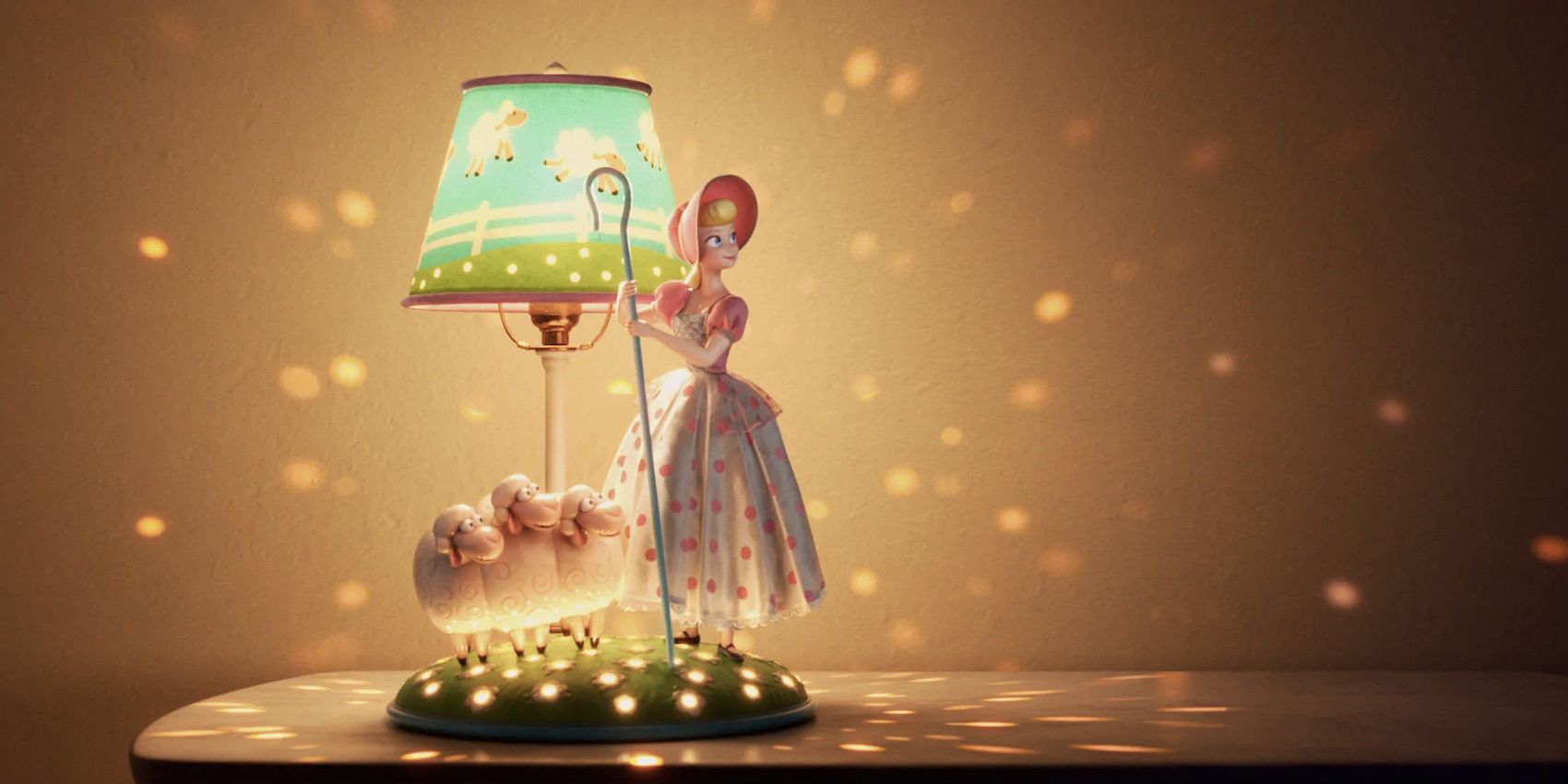 Bo Peep on a lamp with her sheep. 