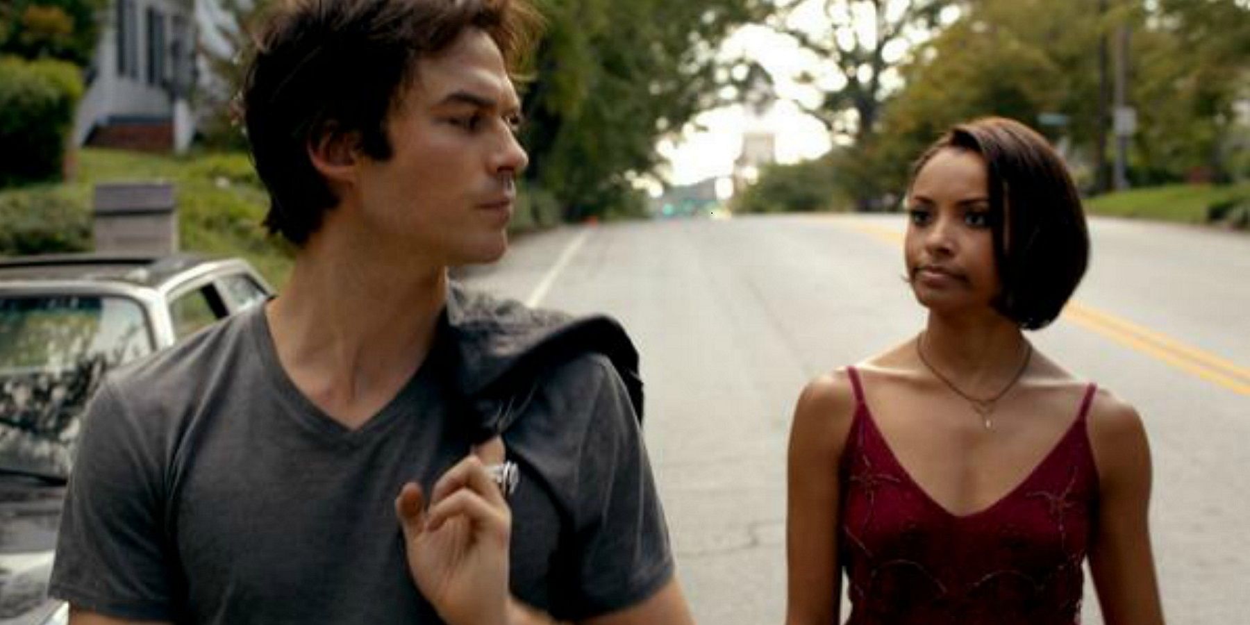 Bonnie and Damon in walking down the street in Vampire Diaries.