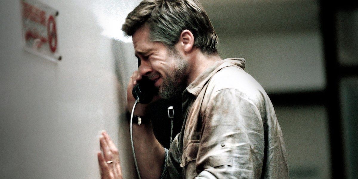 Brad Pitt talking on a phone in Babel