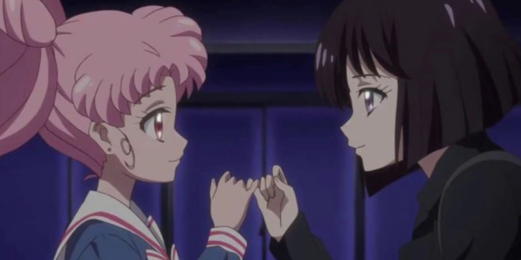 Chibiusa and Hotaru link their fingers in Sailor Moon Crystal